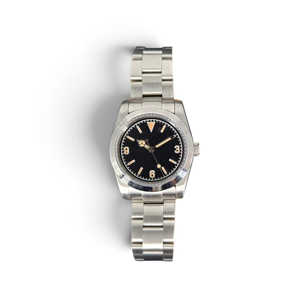 Vintage 3-6-9 NH35 field watch with black dial, aged lume and stainless steel bracelet