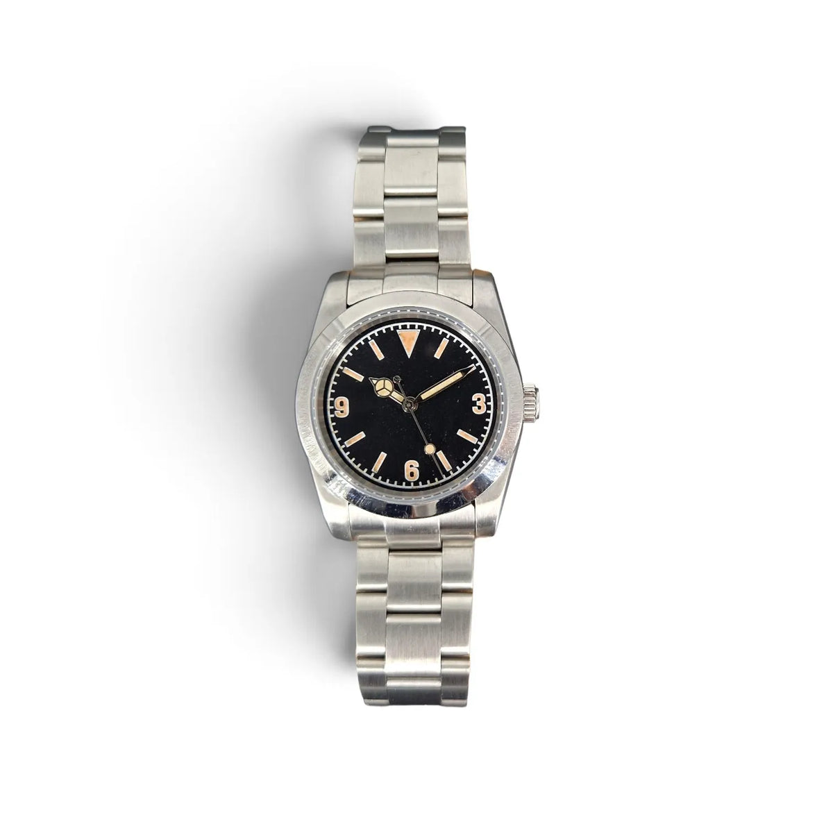 Vintage 3-6-9 NH35 field watch with black dial, aged lume and stainless steel bracelet