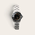 40mm vintage 369 automatic dive watch with aged black dial and faded bezel